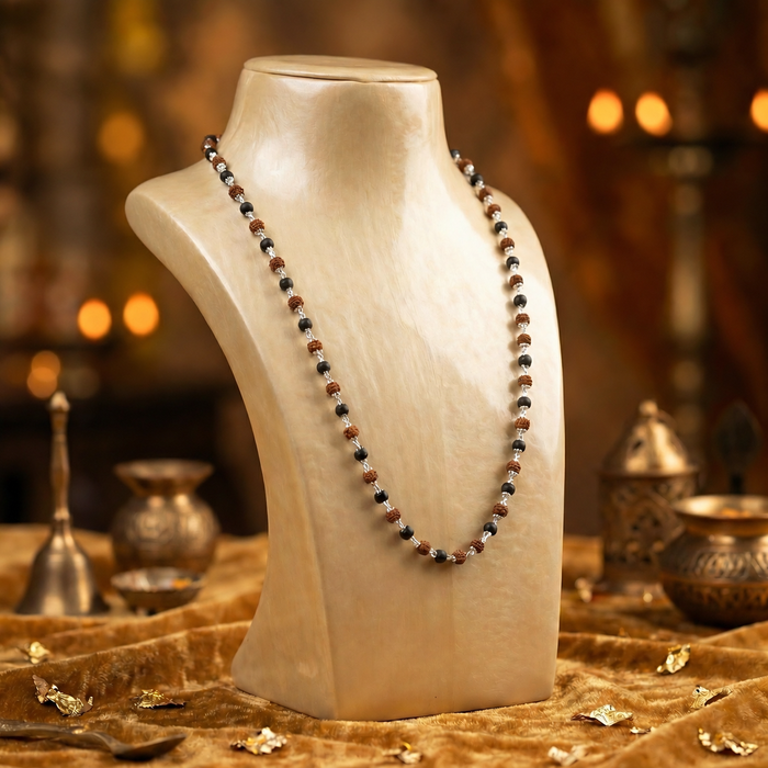 Sterling silver Karungali and Rudraksha malai on a display bust