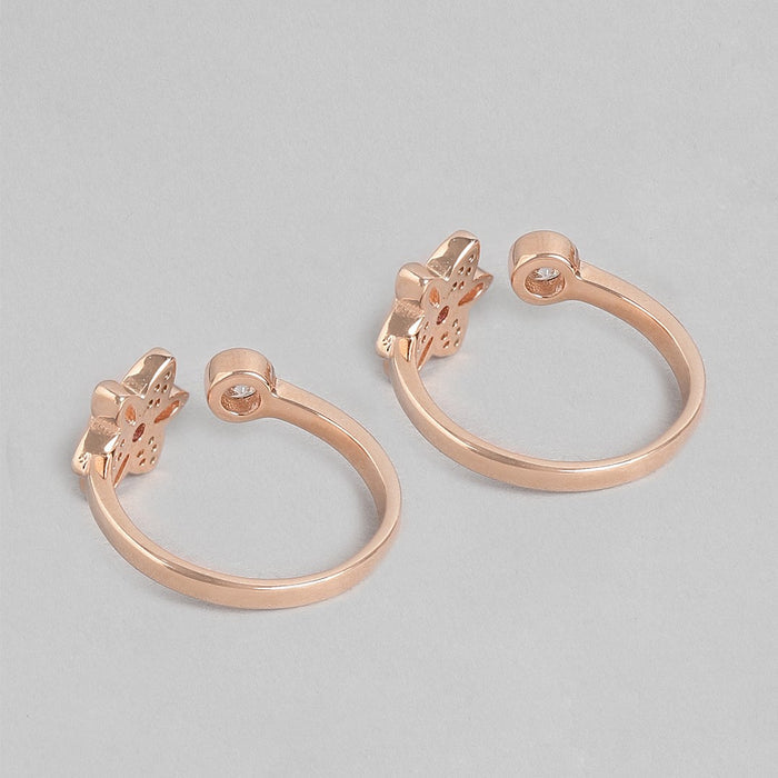 Two rose gold-plated 925 Sterling Silver adjustable floral toe rings for women with cubic zirconia. – Zavya
