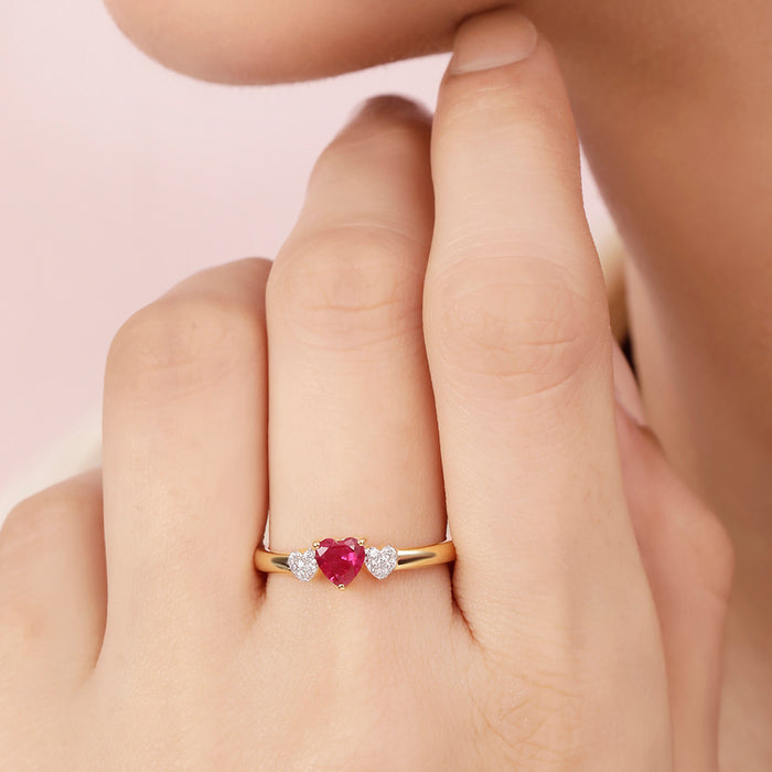 Woman wearing a pink heart gold plated 925 Sterling Silver ring. Beautiful rings for women – Zavya