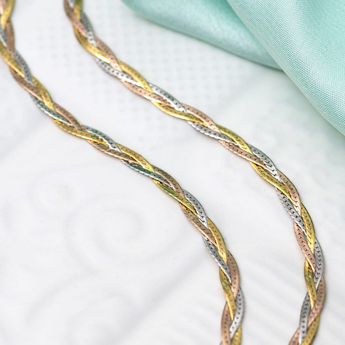 Close-up of a braided triple tone 925 Sterling Silver anklet for women. Elegant daily jewellery. – Zavya