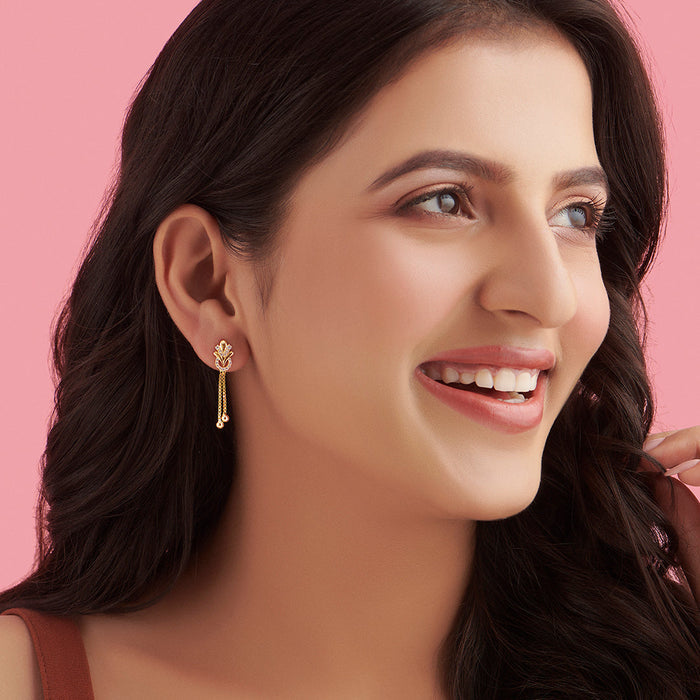 Smiling woman wearing chic gold-plated 925 Sterling Silver drop earrings. Women's jewellery – Zavya