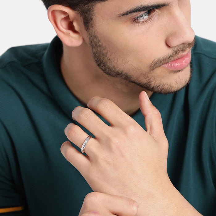 Man wearing a cross CZ 925 Sterling Silver ring. Ideal men's jewelry gift for him – Zavya