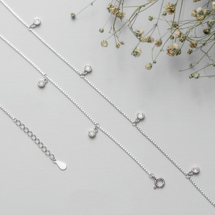 Women's 925 Sterling Silver anklet featuring a delicate chain with clear drop CZ stones and clasp – Zavya