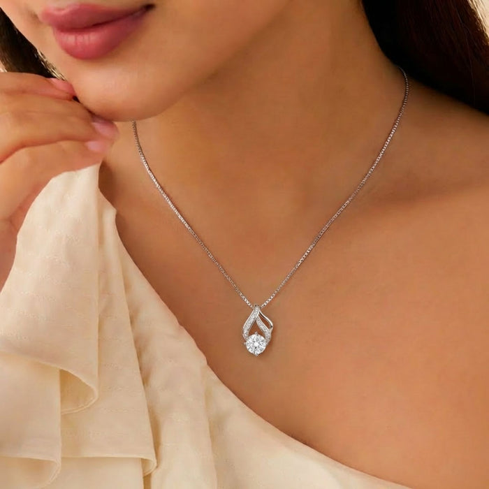 Woman wearing a 925 Sterling Silver teardrop pendant necklace. Dazzling silver jewellery for women – Zavya