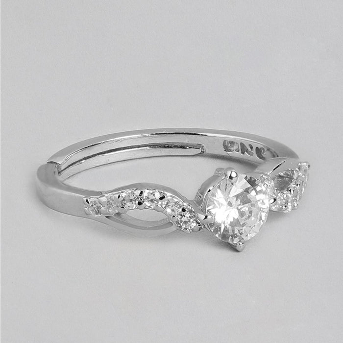 Adjustable 925 Sterling Silver women's ring featuring a round CZ stone and twisted crystal band. – Zavya