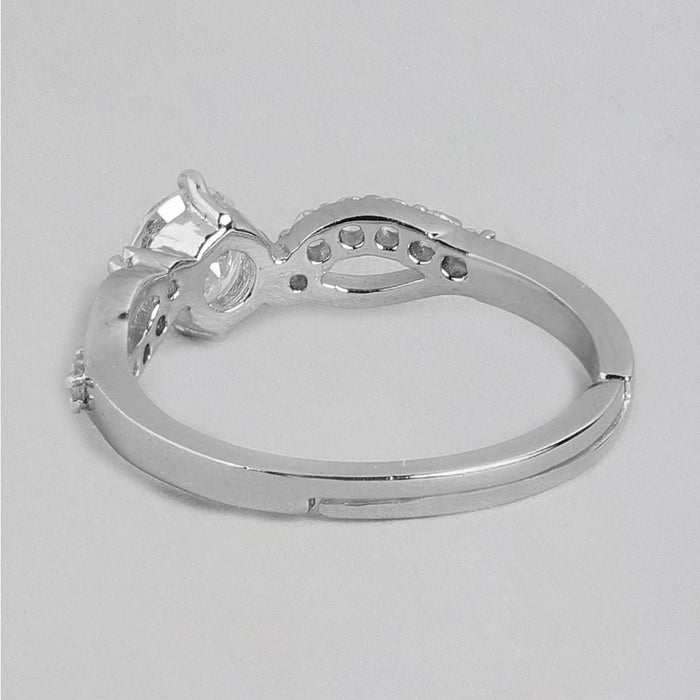Side view of a women's adjustable 925 Sterling Silver ring with a CZ center stone and studded band – Zavya