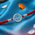 Divine Abstract Ganesha Silver Rakhi (Zavya Signature)