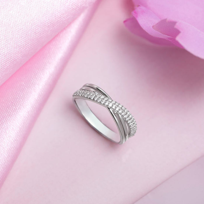 Divine Cross 925 Sterling Silver women's ring with sparkling stones on pink fabric. Silver jewelry – Zavya