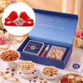 Divine Floral Ganesha Silver Rakhi Dry Fruits Gift Hamper