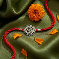 Divine Floral Ganesha Silver Rakhi (Zavya Signature)