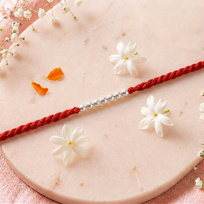 Elegant Seven Beads Silver Rakhi (Zavya Signature)