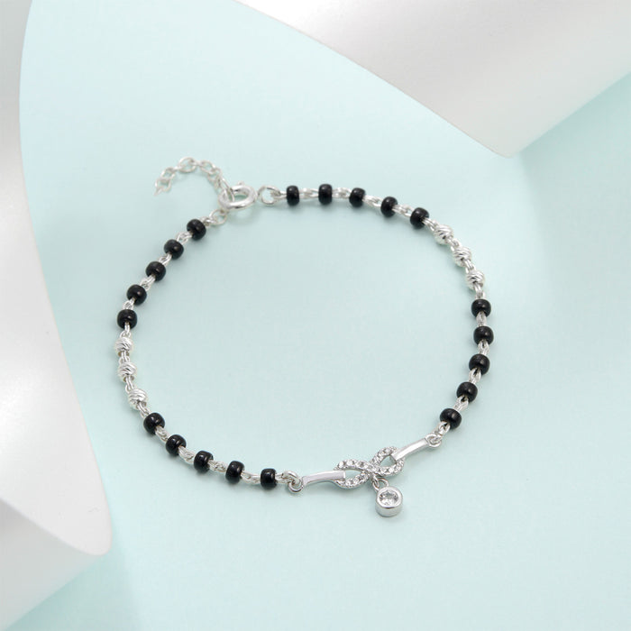 925 Sterling Silver mangalsutra bracelet for women with black beads and an infinity solitaire drop – Zavya