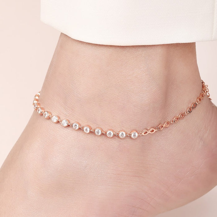 Rose gold plated 925 Sterling Silver anklet for women featuring round crystals on an ankle – Zavya