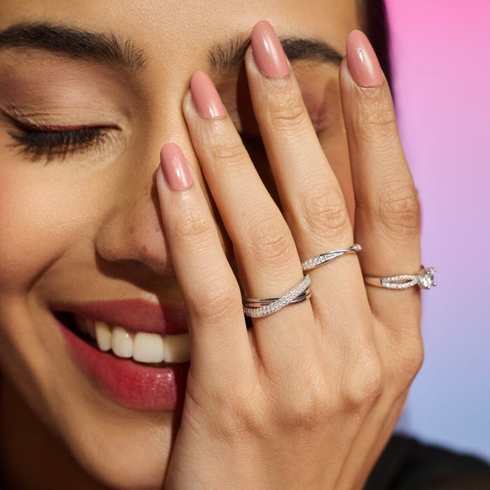 Smiling woman wearing a 925 Sterling Silver adjustable solitaire ring. Beautiful rings for women. – Zavya