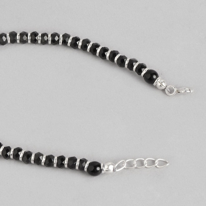 Women's 925 Sterling Silver evil eye bracelet featuring faceted black beads and silver clasp. – Zavya
