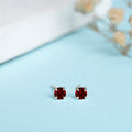 Fiery Elegance Rhodium-Plated 925 Sterling Silver Red Cubic Zirconia Stud Earrings