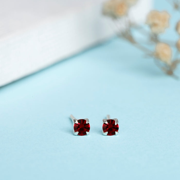 Fiery Elegance Rhodium-Plated 925 Sterling Silver Red Cubic Zirconia Stud Earrings