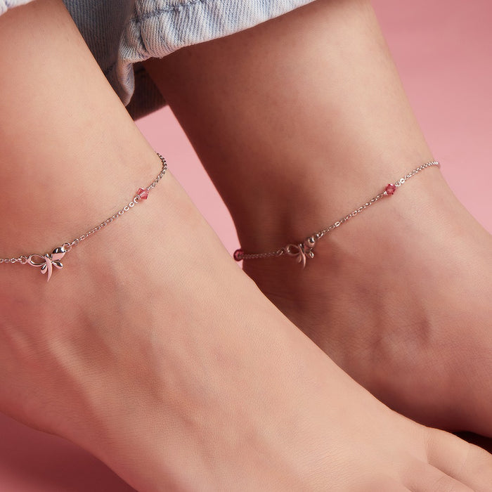 Woman wearing 925 Sterling Silver butterfly anklets with studded stones. Silver jewelry for women – Zavya