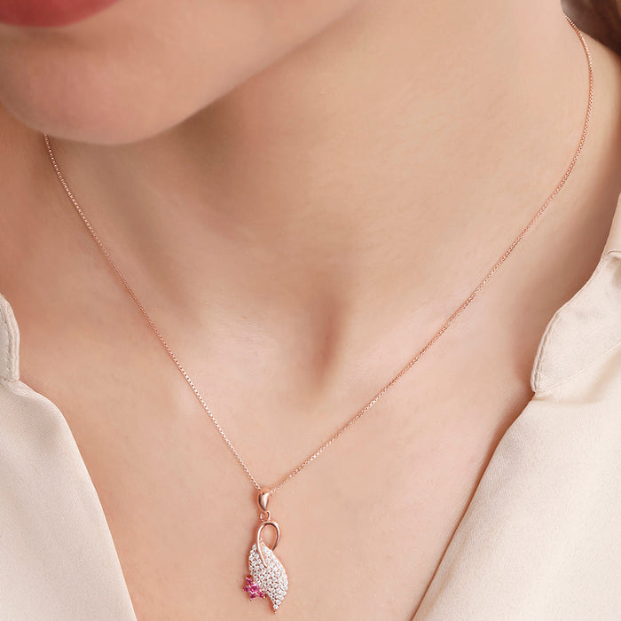 Woman wearing a rose gold 925 Sterling Silver pendant necklace for women, with pink & white stones – Zavya