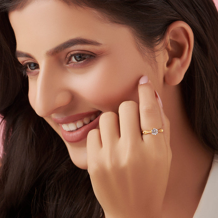 Smiling woman wearing a gold plated 925 Sterling Silver ring. Adjustable everyday jewelry for women. – Zavya