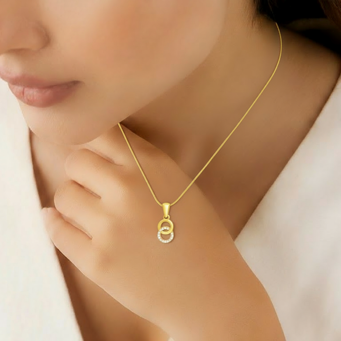 Woman wearing a gold-plated 925 Sterling Silver CZ circle pendant necklace for women. – Zavya
