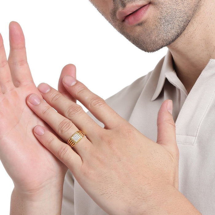 Man's hand wearing a gold-plated 925 Sterling Silver CZ ring. Elegant jewellery gift for him. – Zavya
