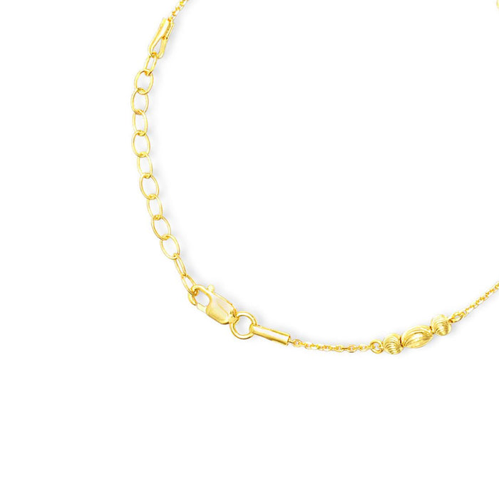 Gold plated 925 Sterling Silver women's bracelet showing elegant beads and adjustable lobster clasp. – Zavya