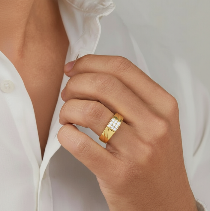 Man wearing a gold-plated 925 Sterling Silver CZ mens ring. Ideal jewelry gift for him – Zavya