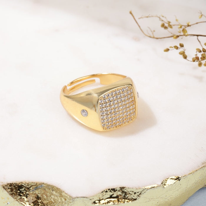Adjustable gold plated 925 Sterling Silver ring for him with a square CZ pave and side stone. – Zavya