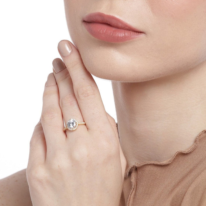 Woman wearing a gold-plated 925 Sterling Silver solitaire halo ring. Elegant rings for women – Zavya