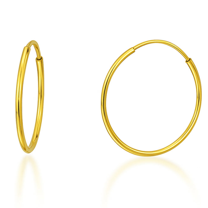Two thin golden 925 Sterling Silver hoop earrings for women. Minimalist everyday jewellery with sleek hoops – Zavya