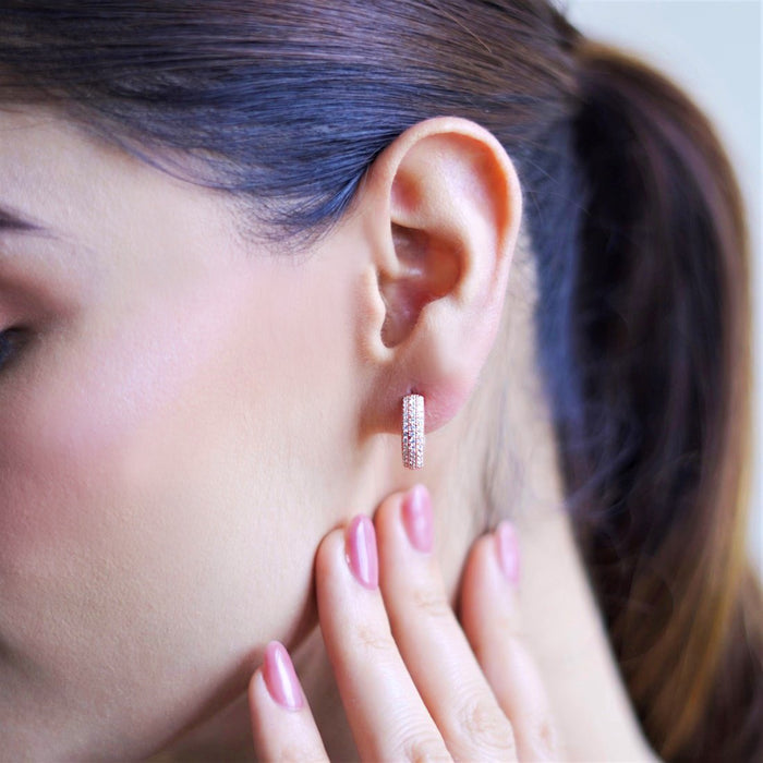 Woman wearing gold-plated 925 Sterling Silver hoop earrings. Elegant women's jewellery. – Zavya