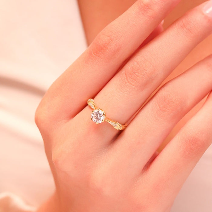 Gold plated 925 Sterling Silver couple ring with a round stone on a woman's hand. Women's jewellery – Zavya