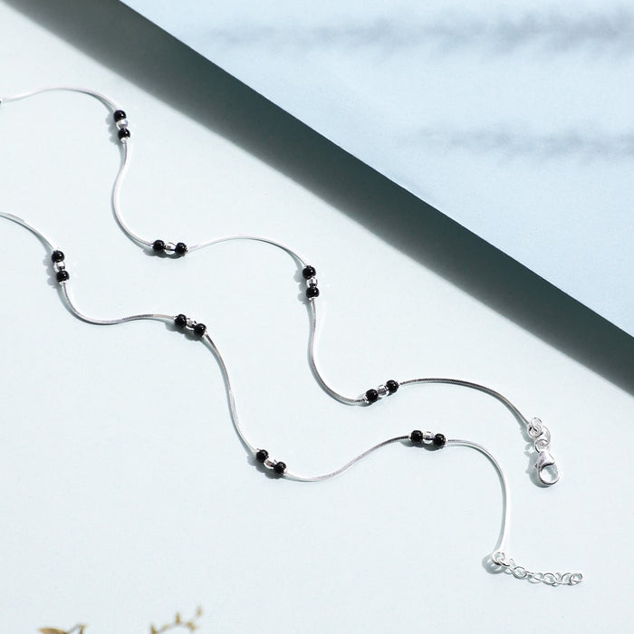 Delicate 925 Sterling Silver anklet for women with small black beads on a thin chain. Minimalist jewelry – Zavya