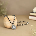 Karungali Malai with Silver-Plated Caps & Oxidized Om Pendant