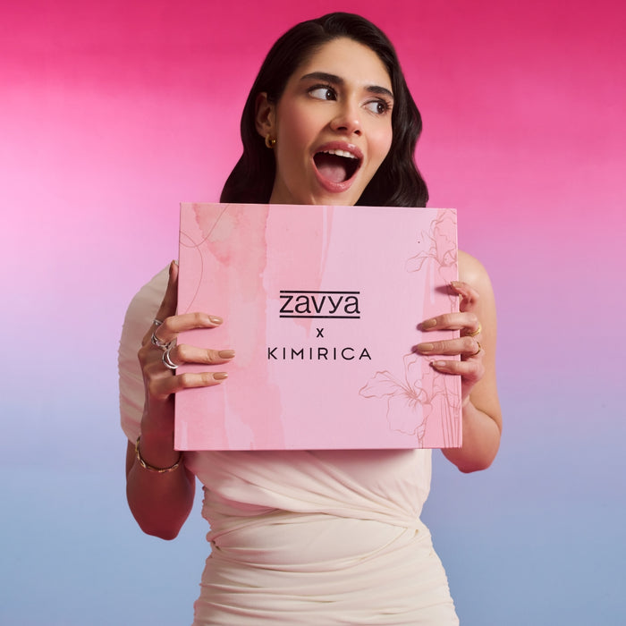 Excited woman holding Kimirica x Zavya hamper, wearing 925 Sterling Silver rings. Jewellery gift for women – Zavya