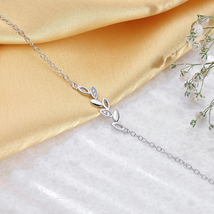 Women's 925 Sterling Silver leafy chain bracelet featuring cubic zirconia stones. – Zavya