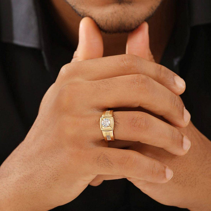 Man wearing a gold-plated 925 Sterling Silver solitaire ring. Perfect men's jewellery gift for him – Zavya