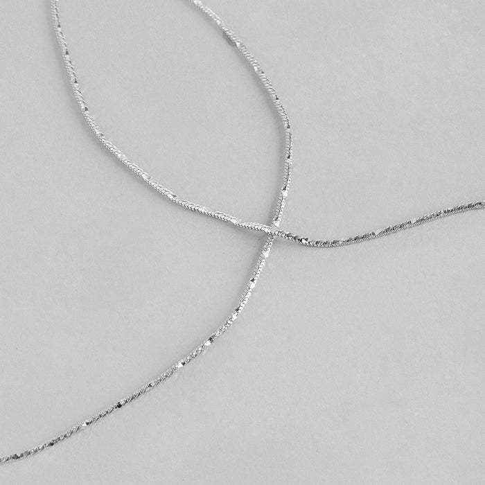 Close-up of a minimal 925 Sterling Silver anklet for women, showing a delicate textured chain design – Zavya