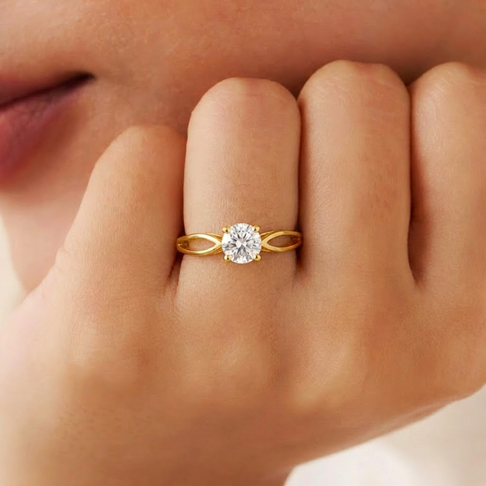 Woman wearing a minimal gold plated 925 Sterling Silver solitaire ring. Everyday jewellery for women – Zavya