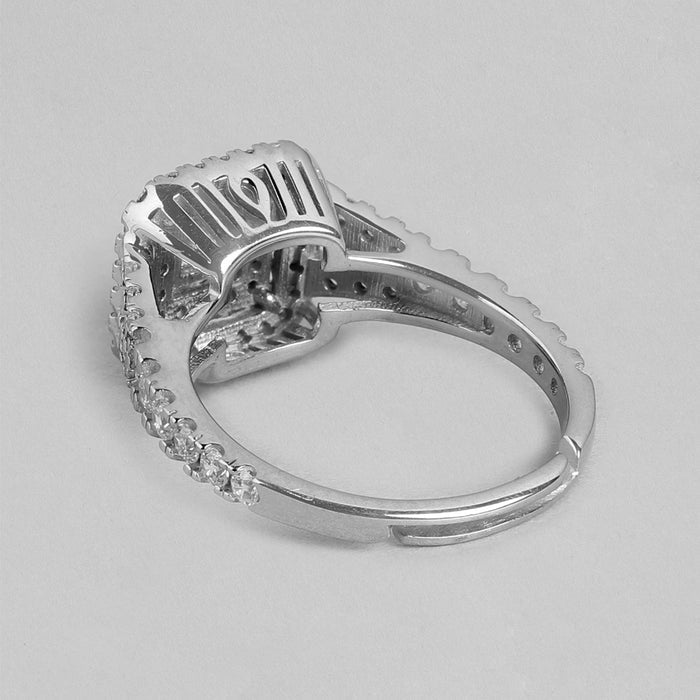 Side profile of a 925 Sterling Silver adjustable CZ ring for women showcasing a stone-studded band – Zavya