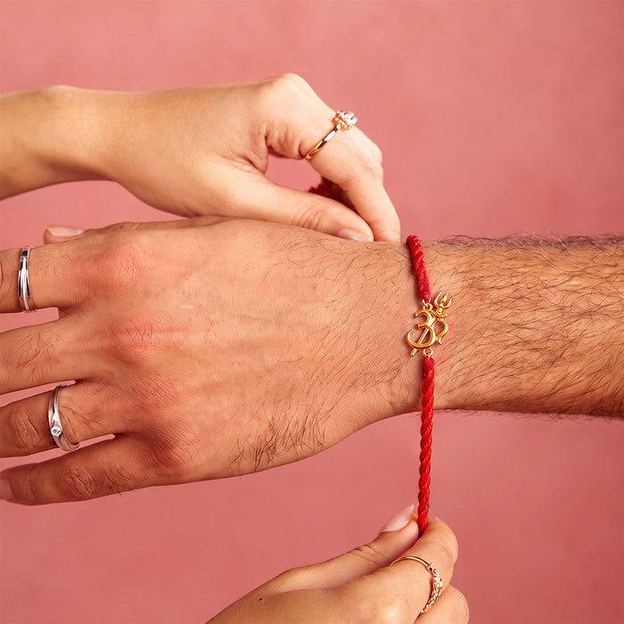 Om Trishul Charm Gold Plated Silver Rakhi (Zavya Signature)