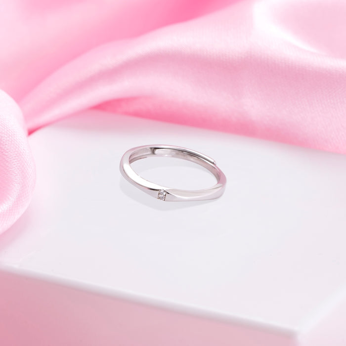 Pure Elegance Sterling Silver Rhodium-Plated Ring with Brilliant Cubic Zirconia (Adjustable)