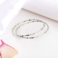 Radiant Reflections Rhodium Plated 925 Silver Bangle