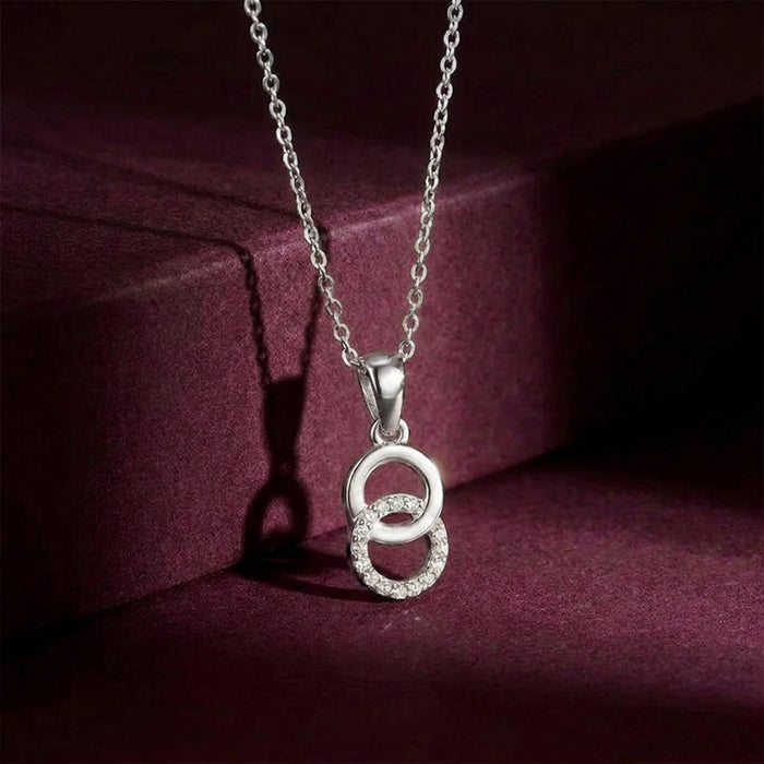 Radiant Revolve CZ Rhodium-Plated 925 Sterling Silver Pendant with Link Chain