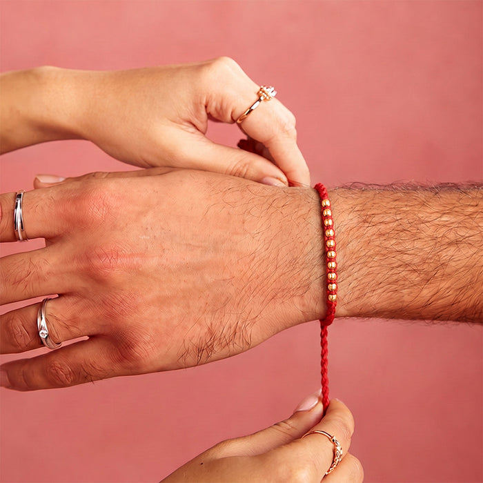 Radiant Thread 10 Beads of Love Gold Plated Silver Rakhi