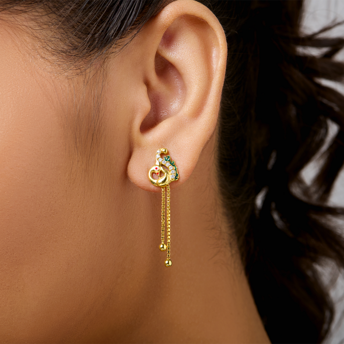 Woman wearing 925 Sterling Silver gold-plated peacock earrings with dangling chains for women – Zavya