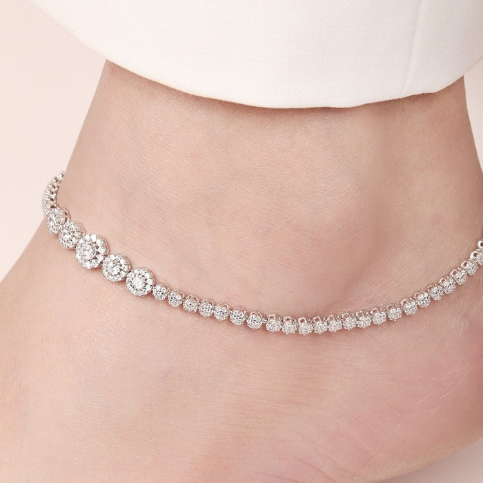 Sparkling CZ 925 Sterling Silver anklet on a woman's ankle. Elegant silver jewellery for women – Zavya