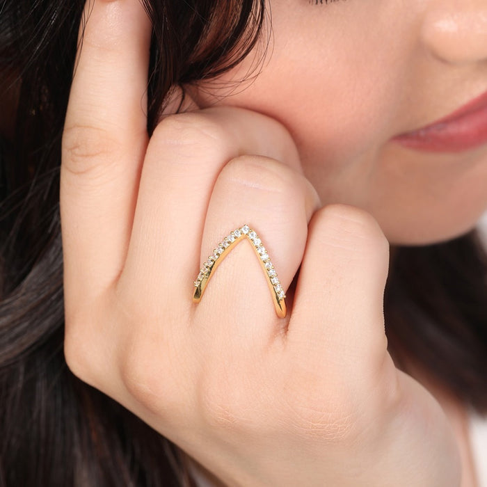 Woman wearing a gold plated 925 Sterling Silver Vanki ring with stones. Women's fine jewellery – Zavya