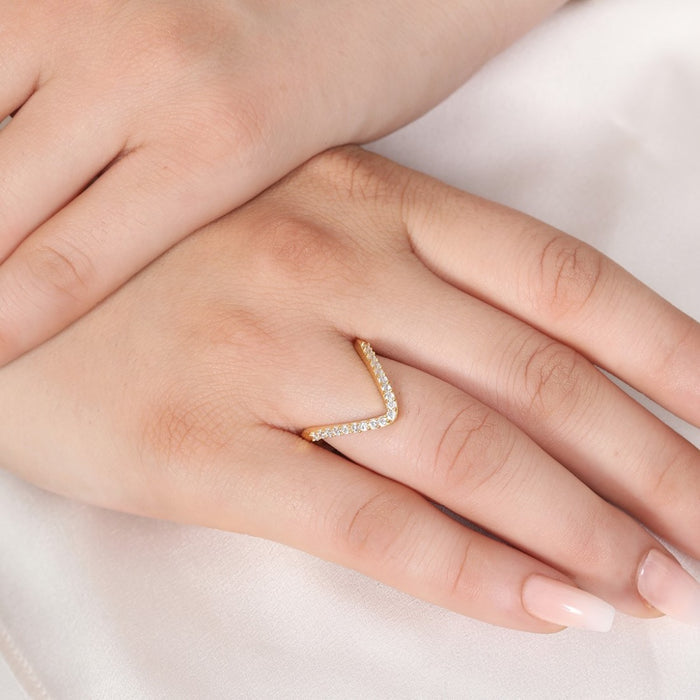 Woman's hand wearing a studded gold plated 925 Sterling Silver crown Vanki ring. Women's jewellery – Zavya